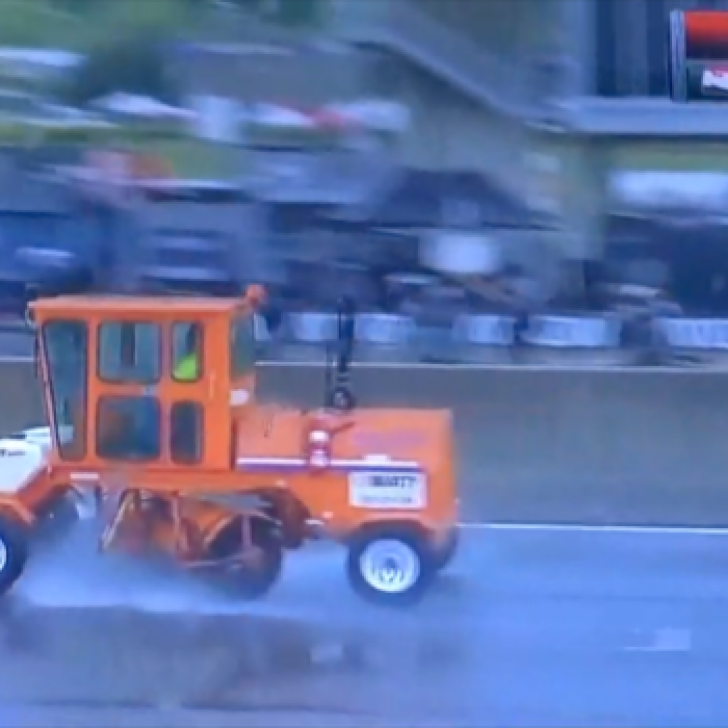 Broce 350 brooms were being used to help clear water off the track at the Honda Indy Grand Prix of Alabama